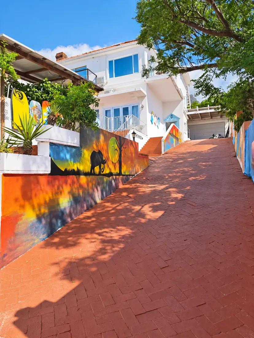 Colourful SeaViu guesthouse exterior with painted walls