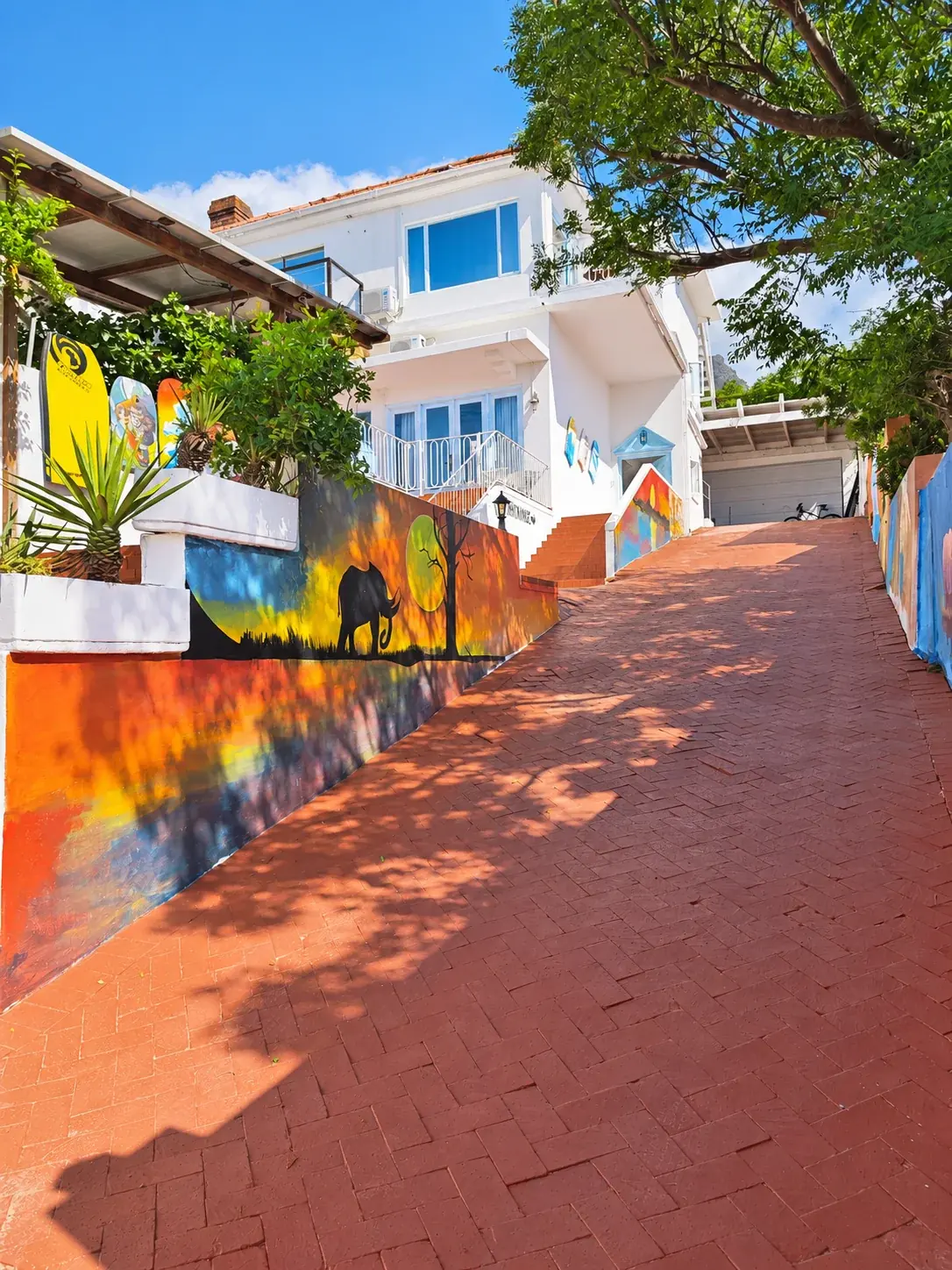 Colourful SeaViu guesthouse exterior with painted walls