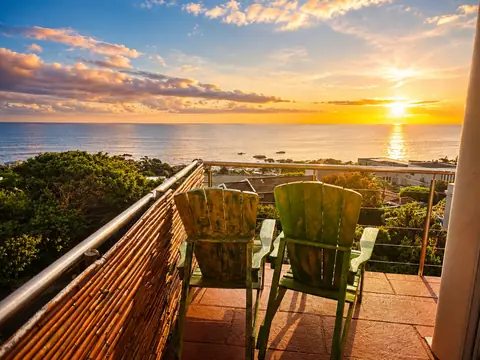 Sunset ocean view from the Leopard Room terrace at VistaBlu